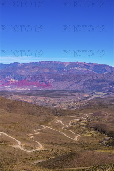 Winding road to the Cerro de 14 colores, Mountains of 14 Colours, Andes, Quebrada de Humahuaca,