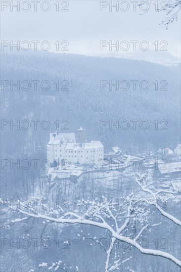 Scharfenstein Castle is a Spornburg on an elongated spur above the village of Scharfenstein