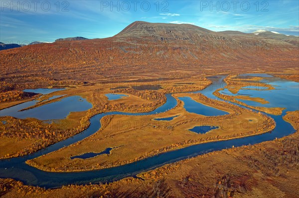 Drone shot, view of the valley Vistasvagge with the meandering river Vistasjakka and countless