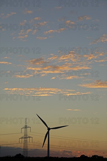 Sunset, wind power station, high voltage pylon, clouds, Melbeck, Ilmenau municipality, Lower