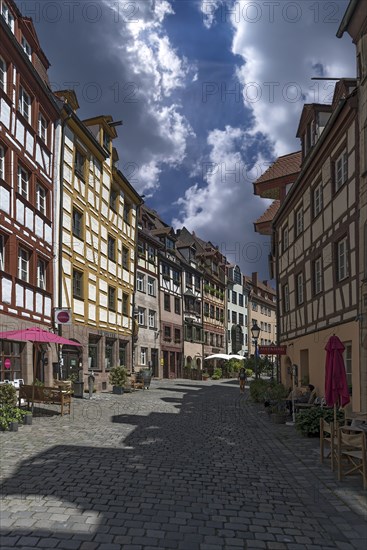 Historic old town alley with medieval half-timbered houses, Weissgerbergasse, Nuremberg, Middle