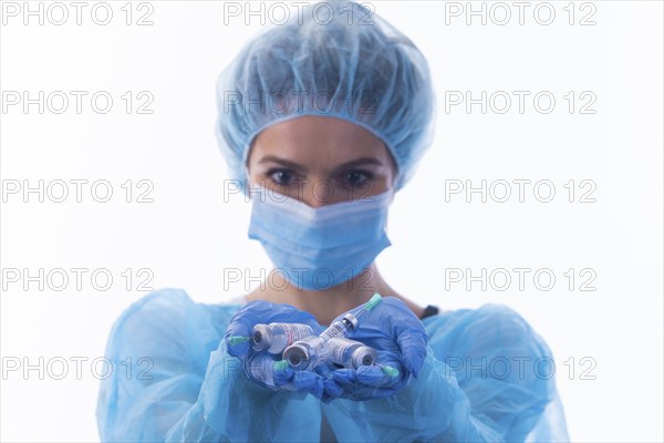 Medical professionals hold corona vaccine