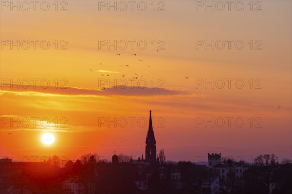 Evening sky over the Elbe with Martin Luther Church