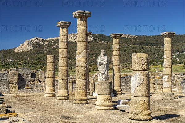 Trajan statue and basilica of the Roman ruins of Baelo Claudia in Bolonia, Tarifa, Costa de la Luz,