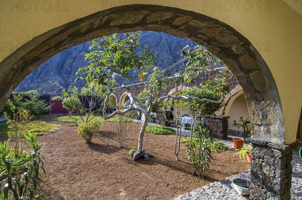 Inner yard of stone house, view through arch. Fogo. Cabo Verde. Africa