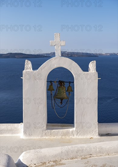 Whitewashed belfry wiith view of caldera and sea, Ia, Oia, Santorini, Greece, Europe