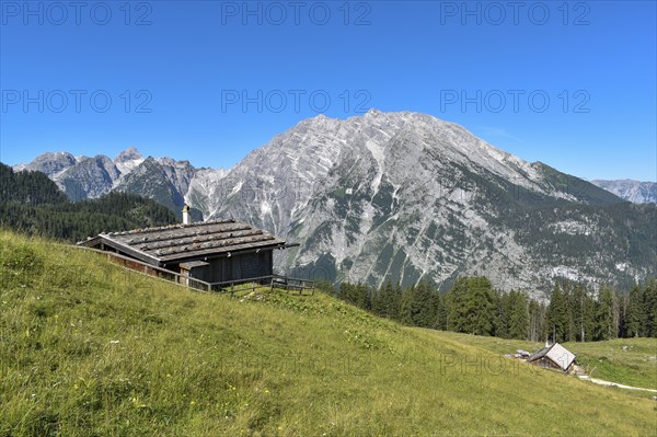 Alpine huts of the Priesbergalm in front of the Watzmann in the Berchtesgaden National Park,