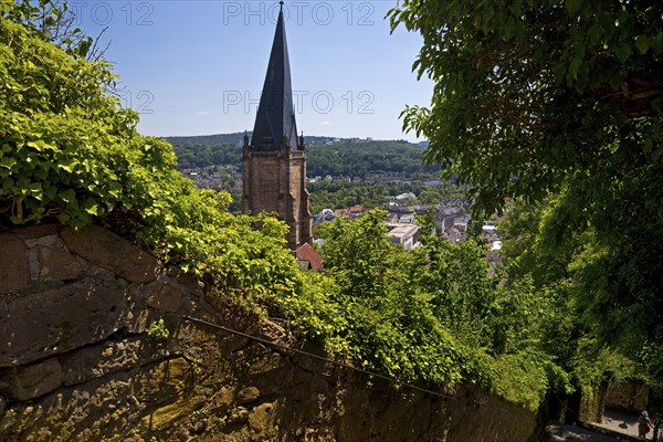 Elevated view from the Schlossberg to the church tower of St. Marien and the steep staircase into