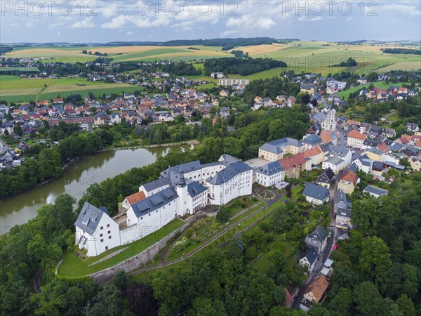 Wildenfels Castle rises on a mountain spur above the town of Wildenfels near Zwickau in Saxony. It