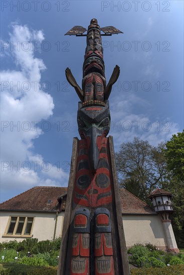 Canadian totem pole in the municipal park of Lahr, Baden-Württemberg, Germany, Europe