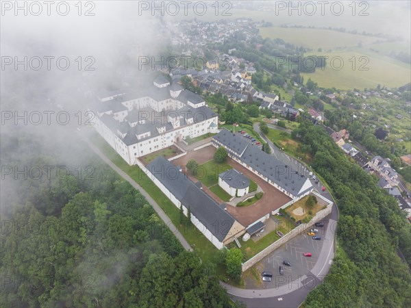 Augustusburg in fog and rain