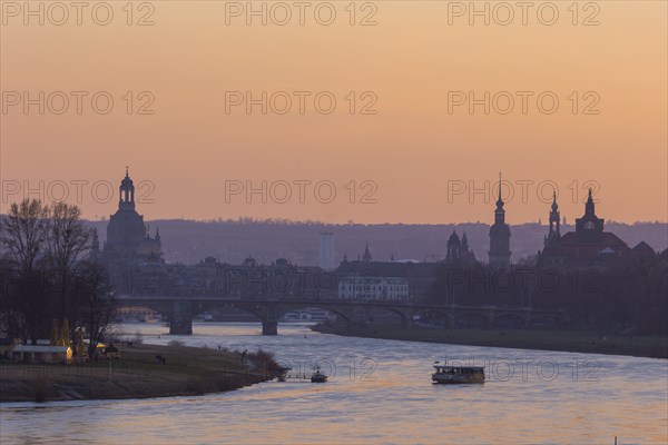 Evening sky over the old town of Dresden with the Church of Our Lady, the castle tower, the