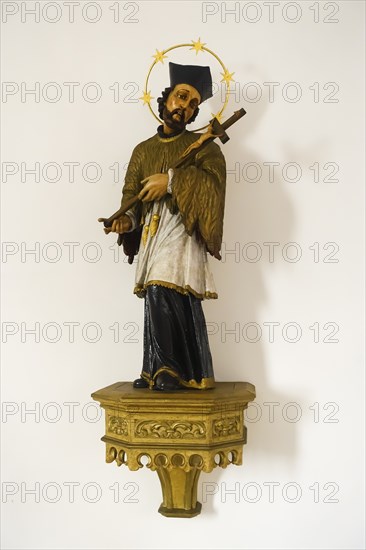 St. John Nepomuk Catholic Church, sacred art, Christian art, statue, figurine, male saint, cross,
