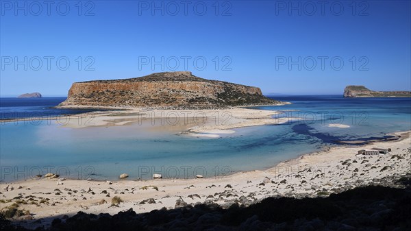 Rocky island with shallow water and sandbank, peaceful and quiet natural scenery, Gramvoussa,
