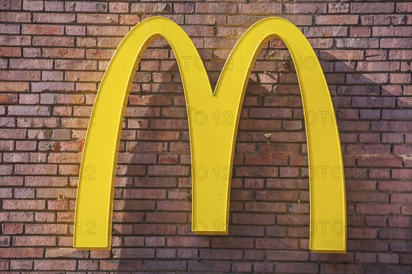 McDonald's logo on a brick wall, Germany, Europe
