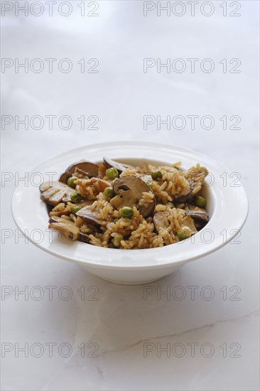 Rice with pork and champignon mushrooms