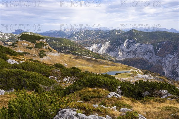 Lake Augstsee and the Atterkogel mountain on the Loser. View of other mountains. Autumn, good