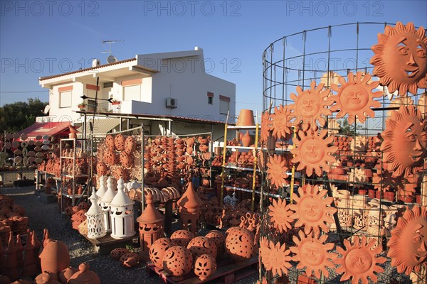 Pottery at Cacela Vehla, Algarve, Portugal, An outdoor area of a shop with lots of terracotta