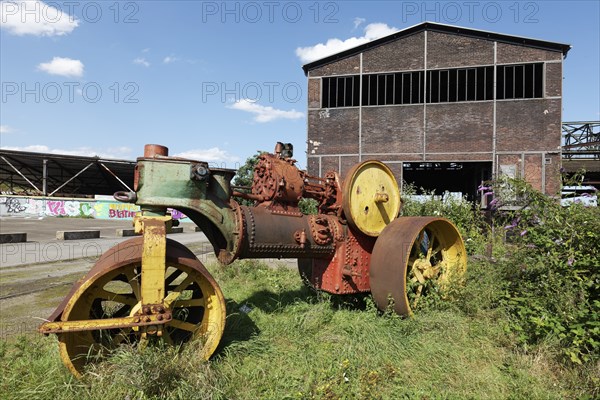 Historic steam roller on the site of the former steelworks, Landschaftspark Duisburg-Nord,