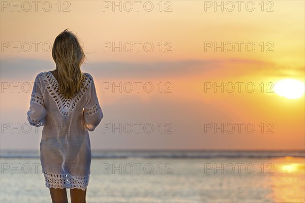 Woman in the evening sun, sea, holiday, sunset, beach, travel, tourism, dress, transparent, summer,