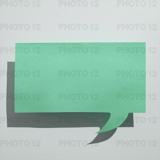 Paper in shape of dialog box with message. Infromation on sticker