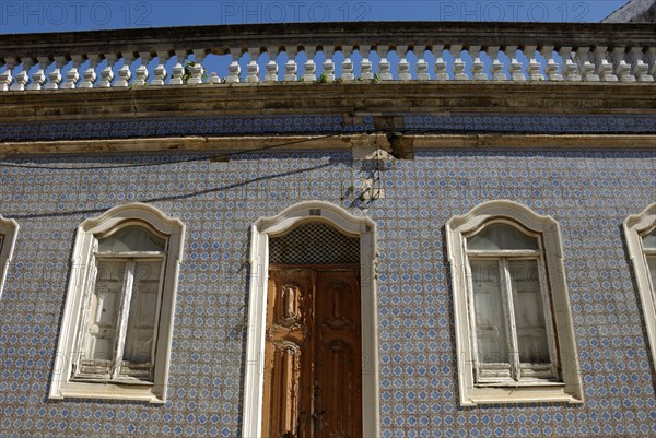 Azulejo façade in the historic centre of Faro, Algarve, Portugal, Europe