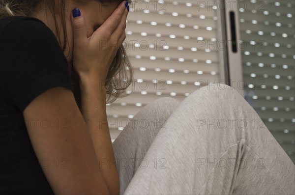 Great concept of depression, sad woman in bed
