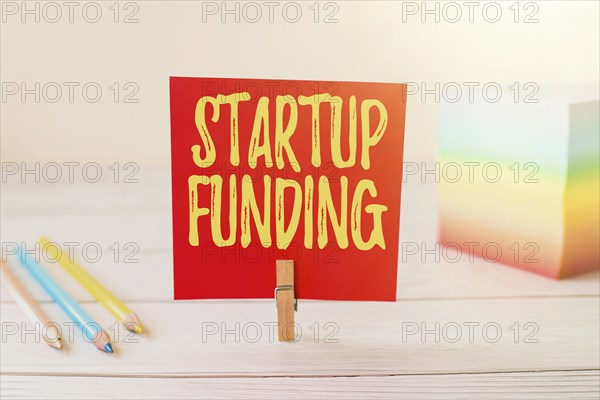 Sign displaying Startup Funding, Concept meaning financial investment in the development of a new
