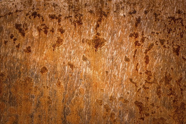 Old rusty metal plate surface very aged and corroded. Image great as background, layer or a rusty