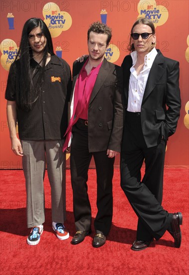 Joseph Quinn, Jamie Campbell Bower, and Eduardo Franco at the 2022 MTV Movie and TV Awards held at