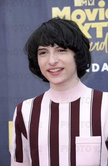 Finn Wolfhard at the 2018 MTV Movie And TV Awards held at the Barker Hangar in Santa Monica, USA on