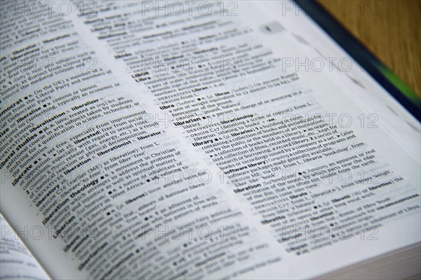 English Dictionary open at the definition of the words Librarian and Library