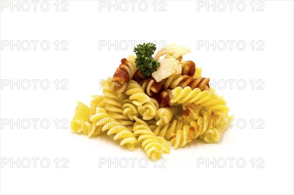 Twisted pasta with a tomato coulis and gruyere cheese on a white background