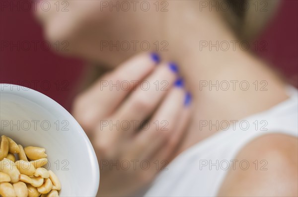Great concept of allergy and skin diseases, young woman scratching herself