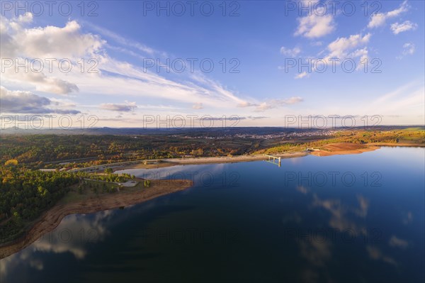 Drone aerial panoramic view of Sabugal Dam lake reservoir with perfect reflection, in Portugal