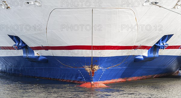 Waterline, bow and bulb of a white ro-ro passenger ferry