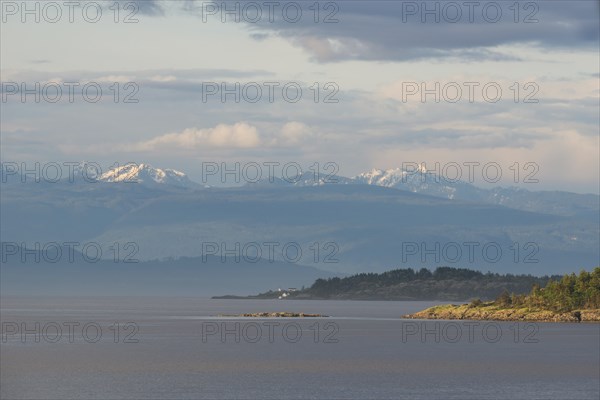 View from Vancouver Island across the Strait of Georgia towards the coastal mountains on the