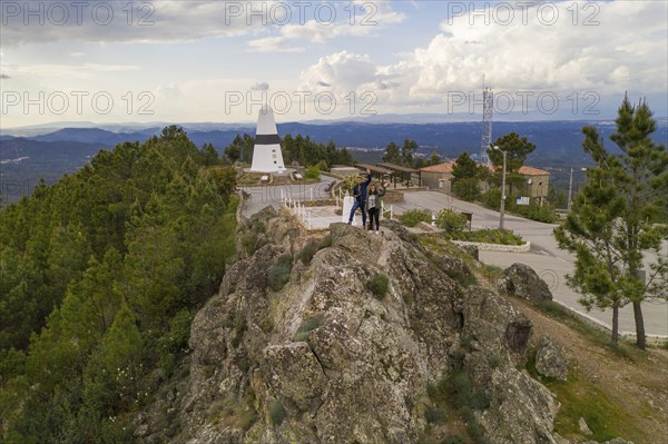 Drone aerial view of a couple in Geographical center Picoto Melrica Centro Geodesico landscape of