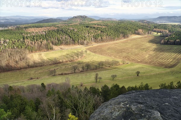 View from the Pfaffenstein. Forests, mountains, fields, vastness, panorama. Landscape from the Elbe