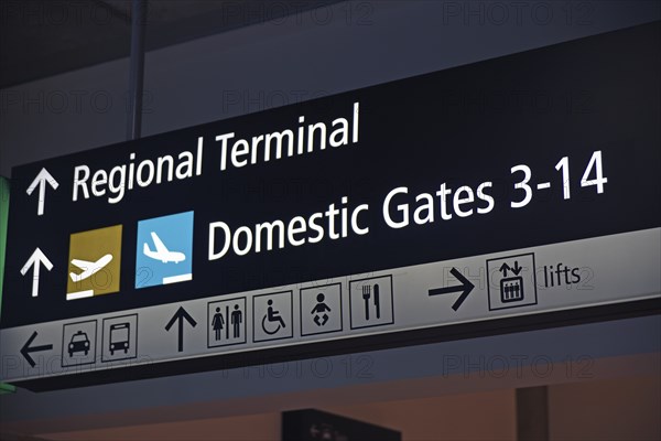 Airport signage directing passengers on regional and domestic flights