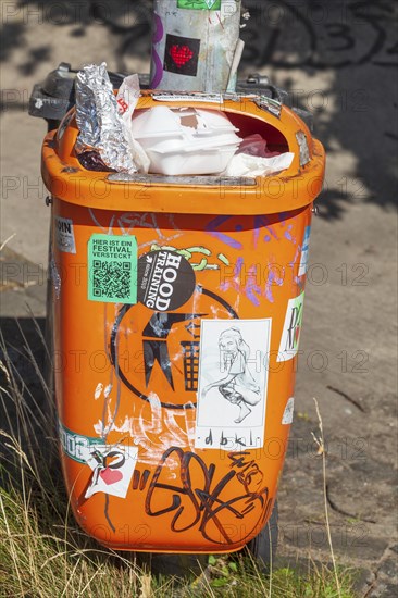 Overfilled public litter bin or rubbish bin, Germany, Europe