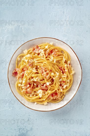 Carbonara pasta dish, traditional spaghetti with pancetta and cheese, shot from the top, Food