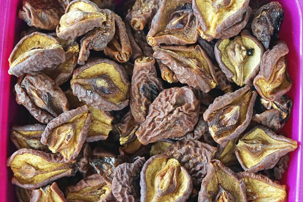 Dried and dehydrated pears fruits in crate
