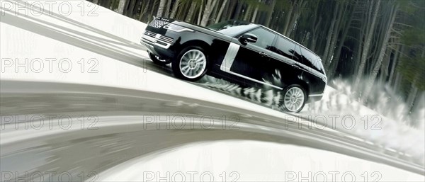 Car speeding through a snowy forest landscape, showcasing dynamic motion, AI generated