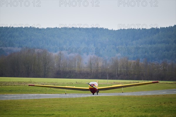 Lightweight aircraft takes off from an airfield in Neumarkt in der Oberpfalz, Bavaria, Germany,