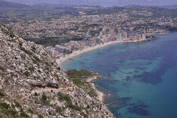 Calp and the Playa Levante beach from the rock Peñón de Ifach or Penyal d’Ifac, Costa Blanca, Calp,