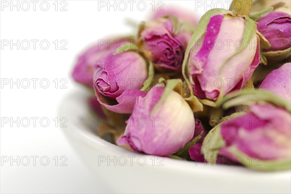 Dried rosebuds in bowl