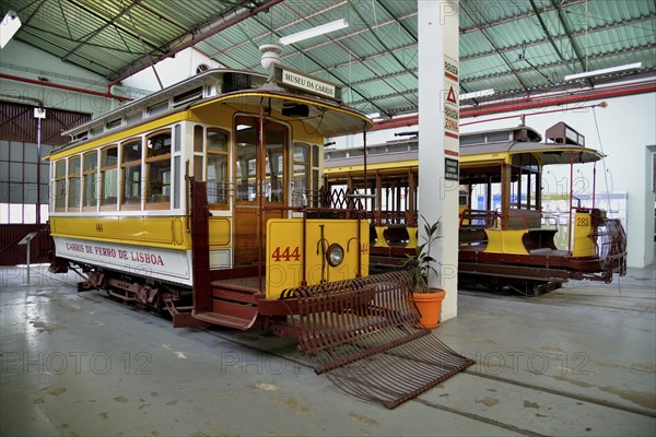 Old trams in the Museu da Carris tram museum, Lisbon, Portugal, Europe