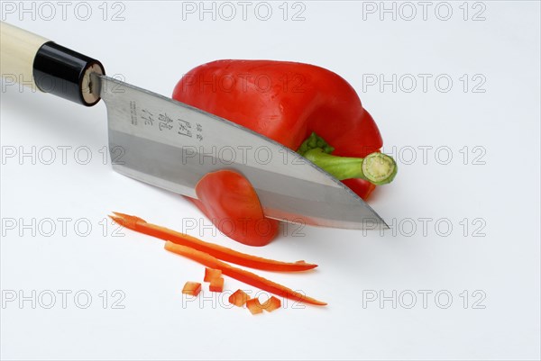 Japanese knife and paprika (Capsicum annuum)