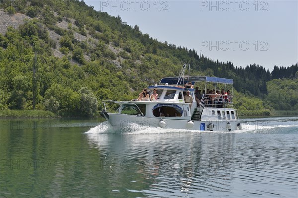 Excursion boat on the Krka River, Krka National Park, Šibenik-Knin County, Dalmatia, Croatia,